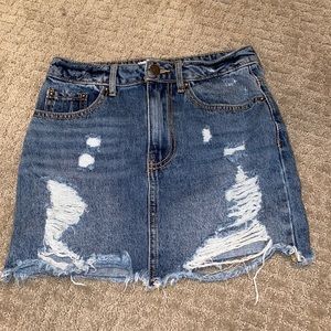 Ripped denim skirt